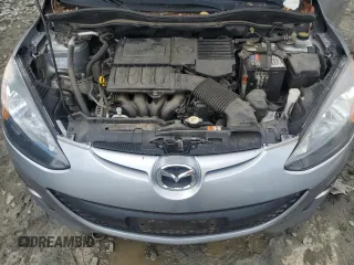 2013 Mazda 2 Touring z VIN JM1DE1LZ7D0153662, wystawiony jako Copart lot #58562435 z przebiegiem 109 329 mil mil oraz Szkoda całkowita • Salvage title. Historia ofert i sprzedaży dostępna na DreamBid. Obrazek 11.