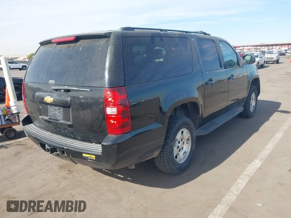 2013 Chevrolet Suburban LS with VIN 1GNSKHE71DR332335, listed as a IAAI auction lot 41408949 with 167,860 mi miles. Bid and sale history available at carsss.com. Image 4.