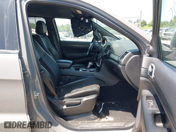 2020 Jeep Grand Cherokee Laredo E with VIN 1C4RJFAG0LC293050, listed as a IAAI auction lot 42566345 with 64,960 mi miles and . Bid and sale history available at DreamBid. Image 5.