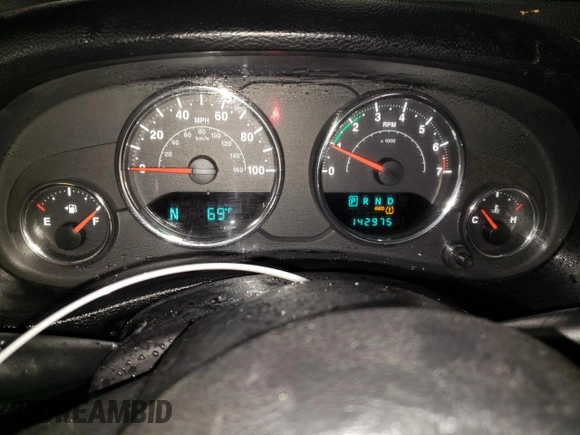 2013 Jeep Wrangler Rubicon with VIN 1C4BJWCG1DL584611, listed as a Copart auction lot 71536944 with 142,975 mi miles and Salvage title. Bid and sale history available at DreamBid. Image 9.