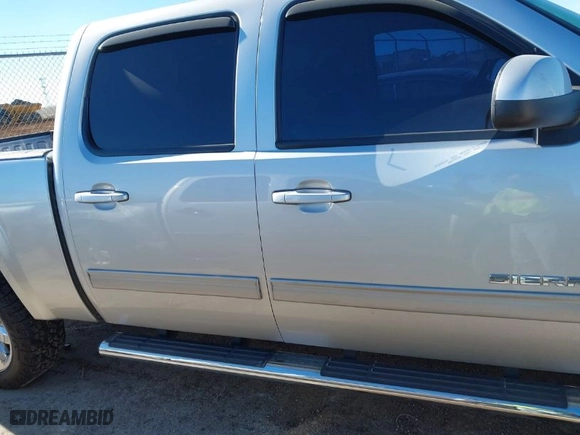 2013 GMC Sierra 1500 SLT with VIN 3GTP2WE78DG323280, listed as a IAAI auction lot 41148621 with 143,491 mi miles. Bid and sale history available at carsss.com. Image 13.