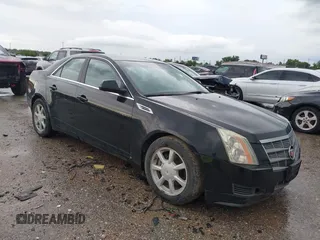 2008 Cadillac CTS RWD with VIN 1G6DF577480205884, listed as a IAAI auction lot 42642021 with 113,725 mi miles and . Bid and sale history available at DreamBid. Image 1.