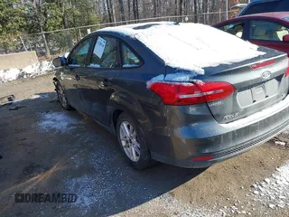 2015 Ford Focus SE with VIN 1FADP3F24FL276766, listed as a IAAI auction lot 41388348 with 59,579 mi miles. Bid and sale history available at carsss.com. Image 3.