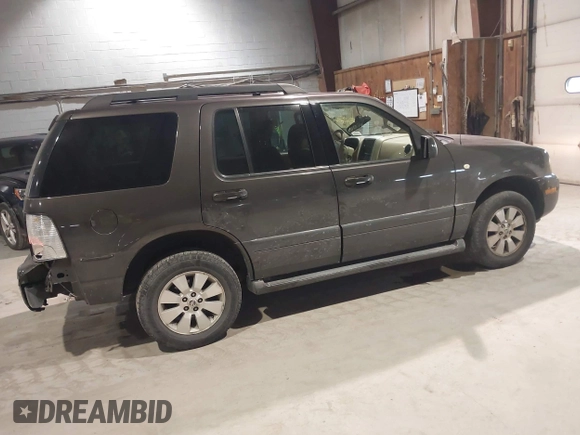2006 Mercury Mountaineer Luxury with VIN 4M2EU47EX6UJ05577, listed as a IAAI auction lot 41315648 with 158,964 mi miles. Bid and sale history available at carsss.com. Image 4.