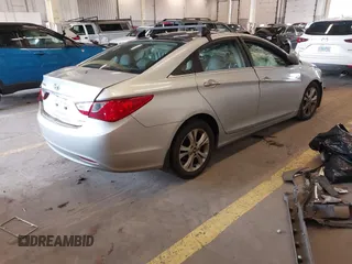 2012 Hyundai Sonata Limited z VIN 5NPEC4AC6CH361933, wystawiony jako IAAI lot #42004586 z przebiegiem 88 500 mil mil oraz . Historia ofert i sprzedaży dostępna na DreamBid. Obrazek 4.