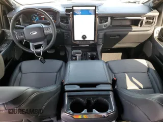 2023 Ford F-150 Lightning Pro с VIN 1FT6W1EV1PWG53186, выставлен на аукционе Copart как лот 52423485 с пробегом 23 518 миль миль и Списание • Salvage title. История ставок и продаж доступна на DreamBid. Изображение 8.