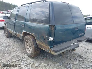 1995 Chevrolet Tahoe with VIN 1GNEK13K3SJ412971, listed as a IAAI auction lot 41940461 with 425,128 mi miles. Bid and sale history available at carsss.com. Image 3.