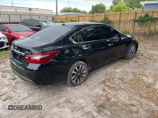 2018 Nissan Altima S with VIN 1N4AL3APXJC195152, listed as a IAAI auction lot 42196836 with 159,552 mi miles and . Bid and sale history available at DreamBid. Image 4.