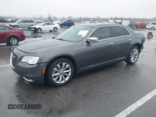 2016 Chrysler 300 with VIN 2C3CCAKG5GH334703, listed as a IAAI auction lot 40877306 with 141,799 mi miles. Bid and sale history available at carsss.com. Image 2.