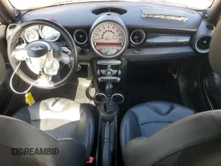 2010 MINI Convertible S with VIN WMWMS3C51ATZ85166, listed as a Copart auction lot 52907775 with 90,090 mi miles and Salvage title. Bid and sale history available at DreamBid. Image 8.