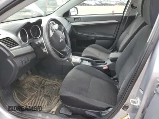 2014 Mitsubishi Lancer SE z VIN JA32V2FW3EU602908, wystawiony jako Copart lot #60148705 z przebiegiem 188 938 mil mil oraz Szkoda całkowita • Salvage title. Historia ofert i sprzedaży dostępna na DreamBid. Obrazek 7.