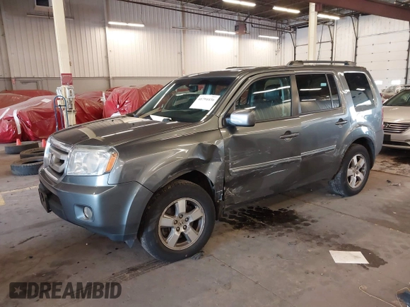 2011 Honda Pilot EX-L with VIN 5FNYF4H65BB020721, listed as a IAAI auction lot 41794436 with 113,630 mi miles and . Bid and sale history available at carsss.com. Image 22.
