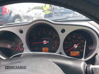 2004 Nissan 350Z Touring z VIN JN1AZ36A94T013851, wystawiony jako IAAI lot #42335966 z przebiegiem 180 814 mil mil oraz . Historia ofert i sprzedaży dostępna na DreamBid. Obrazek 7.