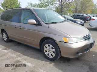 2003 Honda Odyssey EX with VIN 5FNRL186X3B031520, listed as a IAAI auction lot 42095955 with 142,566 mi miles and . Bid and sale history available at carsss.com. Image 1.