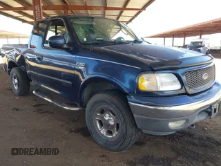 2003 Ford F-150 XL with VIN 1FTRX18W13NB44407, listed as a IAAI auction lot 42559740 with Not provided miles and . Bid and sale history available at DreamBid. Image 1.