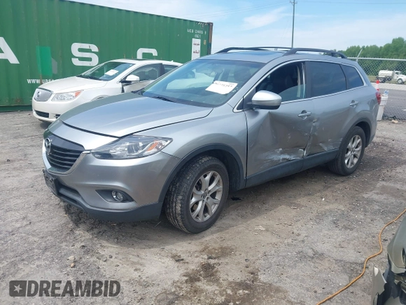 2013 Mazda CX-9 Touring with VIN JM3TB2CV5D0402135, listed as a IAAI auction lot 42108357 with 190,863 mi miles and . Bid and sale history available at DreamBid. Image 2.