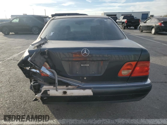 1997 Mercedes-Benz E-Class with VIN WDBJF72F8VA204316, listed as a Copart auction lot 84684614 with 203,748 mi miles and Salvage Title. Bid and sale history available at carsss.com. Image 6.
