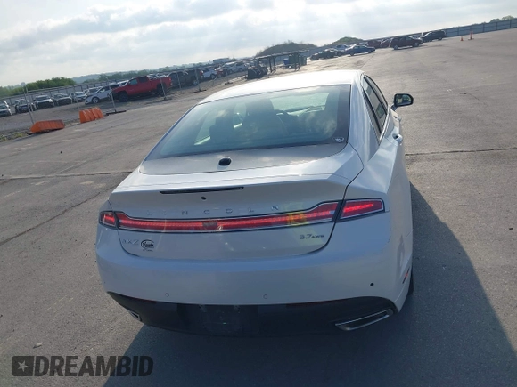 2016 Lincoln MKZ with VIN 3LN6L2JK0GR627283, listed as a IAAI auction lot 42271206 with 52,890 mi miles and . Bid and sale history available at DreamBid. Image 17.