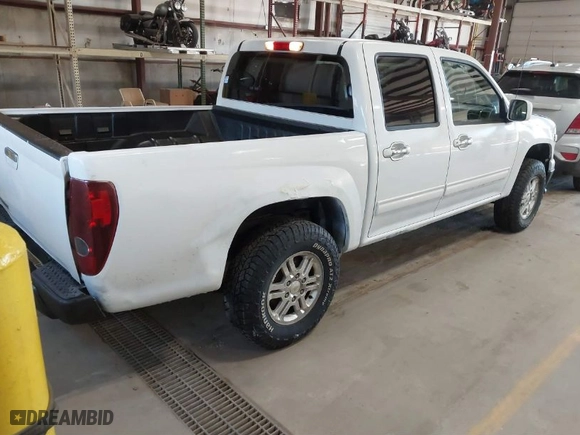 2012 Chevrolet Colorado LT w/1LT with VIN 1GCHTCFEXC8128458, listed as a IAAI auction lot 41758826 with 267,202 mi miles. Bid and sale history available at carsss.com. Image 4.