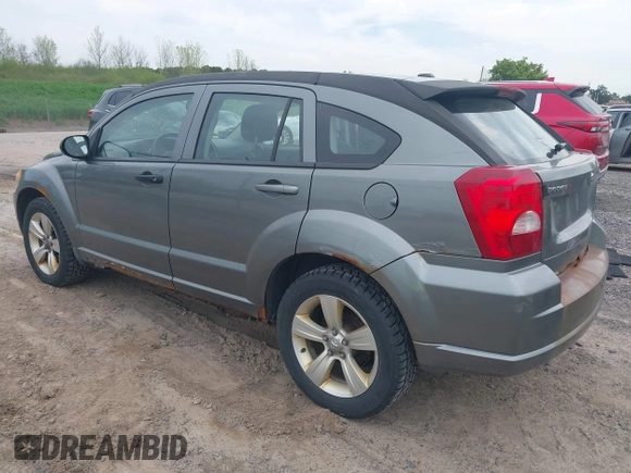2012 Dodge Caliber SXT with VIN 1C3CDWDA5CD534457, listed as a IAAI auction lot 42197032 with 170,739 mi miles and . Bid and sale history available at DreamBid. Image 3.