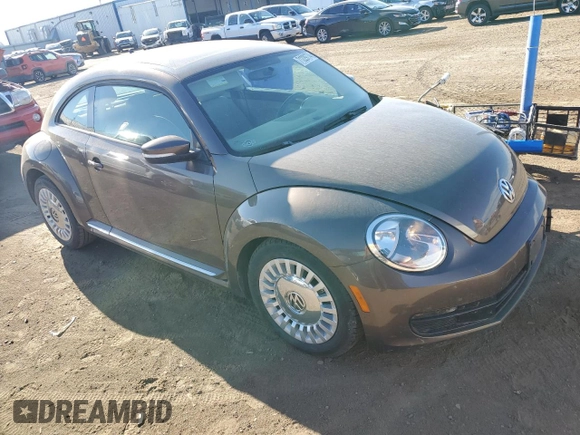 2015 Volkswagen Beetle with VIN 3VWH17AT3FM604193, listed as a Copart auction lot 72023304 with 49,958 mi miles and Salvage Title. Bid and sale history available at DreamBid. Image 4.