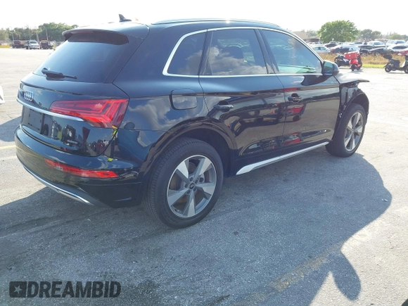 2023 Audi Q5 Premium Plus z VIN WA1BBAFY9P2085449, wystawiony jako IAAI lot #41508525 z przebiegiem 11 225 mil mil oraz . Historia ofert i sprzedaży dostępna na DreamBid. Obrazek 4.