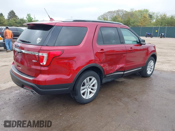 2018 Ford Explorer XLT z VIN 1FM5K8DH8JGA13677, wystawiony jako IAAI lot #42259550 z przebiegiem 71 257 mil mil oraz . Historia ofert i sprzedaży dostępna na DreamBid. Obrazek 4.