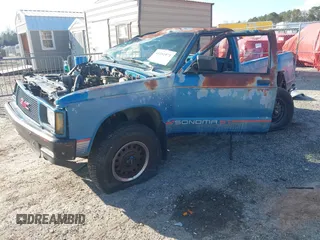 1991 GMC Sonoma with VIN 1GTCT14Z1M8503336, listed as a IAAI auction lot 41251971 with 139,795 mi miles and . Bid and sale history available at DreamBid. Image 17.
