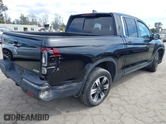 2020 Honda Ridgeline RTL with VIN 5FPYK3F53LB030107, listed as a IAAI auction lot 41933517 with 93,373 mi miles and . Bid and sale history available at DreamBid. Image 4.