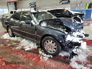 2004 Acura RL w/Navigation System with VIN JH4KA96684C001616, listed as a Copart auction lot 83496294 with 0 mi miles and Salvage Title. Bid and sale history available at carsss.com. Image 4.