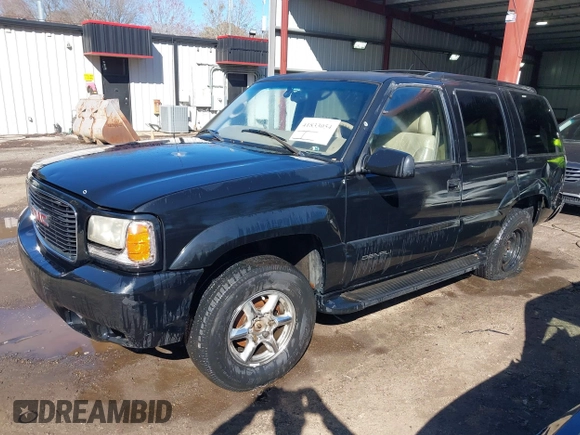 2000 GMC Denali with VIN 1GKEK13R1YR129862, listed as a IAAI auction lot 41833054 with 223,811 mi miles. Bid and sale history available at carsss.com. Image 17.