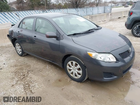 2009 Toyota Corolla with VIN 1NXBU40E99Z138136, listed as a IAAI auction lot 41967052 with 207,892 mi miles. Bid and sale history available at carsss.com. Image 1.