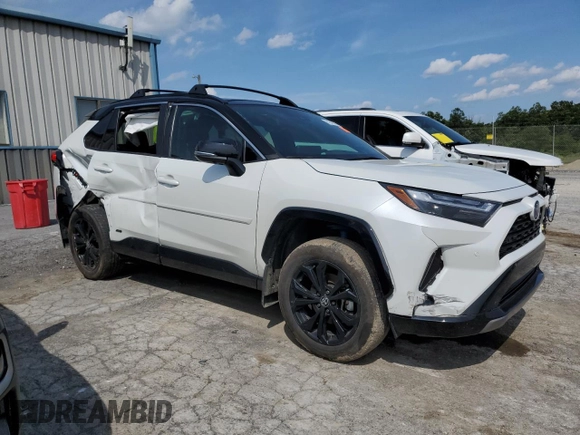 2023 Toyota RAV4 Hybrid XSE with VIN 2T3E6RFVXPW040152, listed as a Copart auction lot 61645565 with 26,408 mi miles and Salvage title. Bid and sale history available at DreamBid. Image 4.