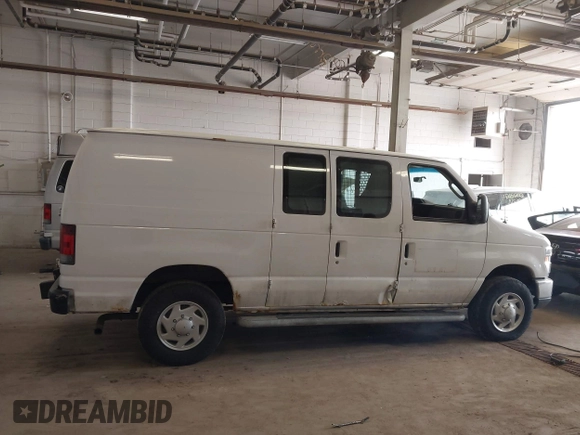 2013 Ford Econoline Cargo Commercial with VIN 1FTNE2EW0DDA16097, listed as a IAAI auction lot 42172617 with 369,619 mi miles and . Bid and sale history available at DreamBid. Image 13.