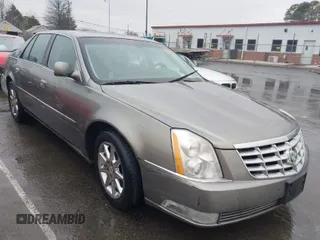 2011 Cadillac DTS Luxury Collection with VIN 1G6KD5E66BU125347, listed as a IAAI auction lot 41760492 with 111,815 mi miles and . Bid and sale history available at DreamBid. Image 1.