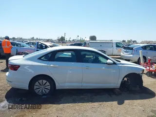 2020 Volkswagen Jetta S z VIN 3VWCB7BU8LM056279, wystawiony jako IAAI lot #42313645 z przebiegiem Nie podano mil oraz . Historia ofert i sprzedaży dostępna na DreamBid. Obrazek 14.