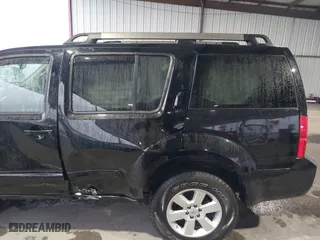 2011 Nissan Pathfinder LE with VIN 5N1AR1NB8BC633188, listed as a IAAI auction lot 41608356 with 128,377 mi miles. Bid and sale history available at carsss.com. Image 6.