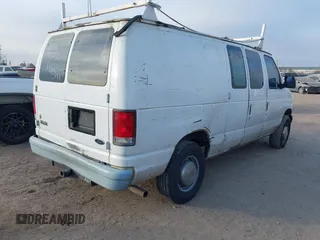 1999 Ford Econoline Cargo Commercial with VIN 1FTNE24L3XHB84868, listed as a IAAI auction lot 41151145 with 450,651 mi miles and . Bid and sale history available at carsss.com. Image 4.