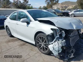 2023 Toyota Camry SE with VIN 4T1T11AK8PU138805, listed as a IAAI auction lot 41977827 with 19,661 mi miles and . Bid and sale history available at DreamBid. Image 1.