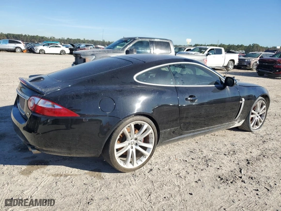2008 Jaguar XK with VIN SAJWA43C689B24998, listed as a Copart auction lot 84232444 with 187,416 mi miles and Salvage Title. Bid and sale history available at carsss.com. Image 3.