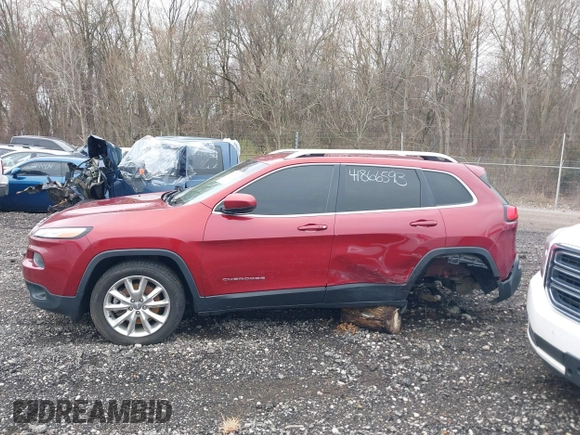 2015 Jeep Cherokee Limited with VIN 1C4PJLDB8FW732892, listed as a IAAI auction lot 41866593 with 153,477 mi miles and . Bid and sale history available at DreamBid. Image 14.