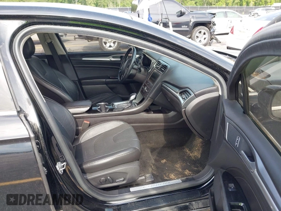 2016 Ford Fusion Titanium with VIN 3FA6P0K90GR179528, listed as a IAAI auction lot 42181213 with 230,264 mi miles. Bid and sale history available at carsss.com. Image 5.