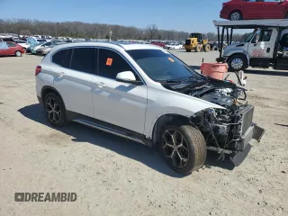 2018 BMW X1 xDrive28i with VIN WBXHT3C38J3H32142, listed as a Copart auction lot 48677365 with 0 mi miles and Clean Title. Bid and sale history available at carsss.com. Image 4.