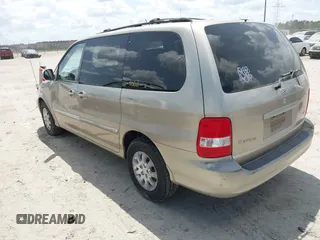 2005 Kia Sedona LX with VIN KNDUP131756627998, listed as a IAAI auction lot 42058213 with 152,433 mi miles. Bid and sale history available at carsss.com. Image 3.