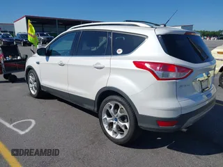 2014 Ford Escape Titanium с VIN 1FMCU0J94EUB92694, выставлен на аукционе IAAI как лот 42124647 с пробегом 107 666 миль миль и . История ставок и продаж доступна на DreamBid. Изображение 3.