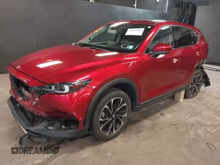 2023 Mazda CX-5 2.5 S Premium Plus Package with VIN JM3KFBEM5P0164568, listed as a IAAI auction lot 41843961 with 22,891 mi miles. Bid and sale history available at carsss.com. Image 2.