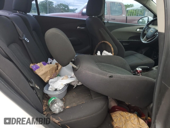 2013 Chevrolet Sonic LT with VIN 1G1JC5SH9D4137246, listed as a Copart auction lot 56001065 with 141,545 mi miles and Clean Title. Bid and sale history available at DreamBid. Image 10.