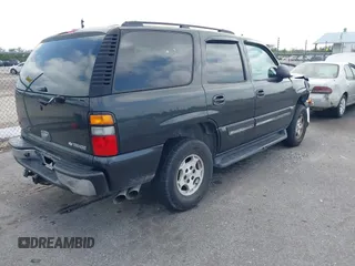 2005 Chevrolet Tahoe LS with VIN 1GNEC13V35R263104, listed as a IAAI auction lot 41918482 with 208,520 mi miles and . Bid and sale history available at DreamBid. Image 4.