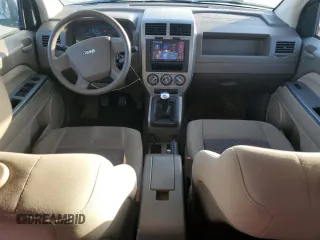 2007 Jeep Compass Sport with VIN 1J8FF47W07D199198, listed as a Copart auction lot 52092675 with 131,346 mi miles and Salvage Title. Bid and sale history available at carsss.com. Image 8.