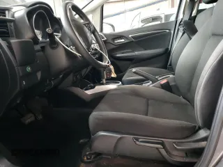 2016 Honda Fit EX with VIN JHMGK5H75GX034913, listed as a Copart auction lot 63948425 with 106,684 mi miles and Salvage title. Bid and sale history available at DreamBid. Image 7.